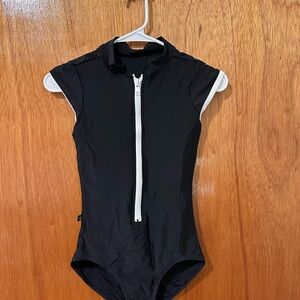Black zip up capped sleeve leotard